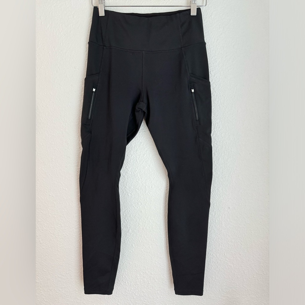 Athleta high traverse tight leggings in black pockets women’s size S high rise